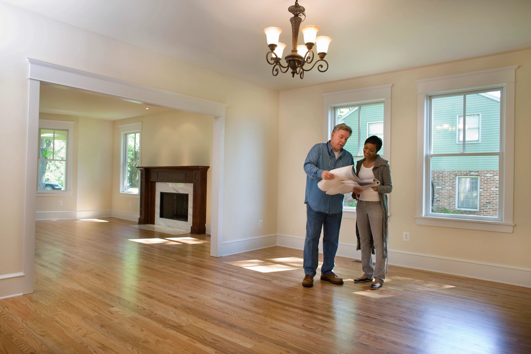 Inspector reviewing new construction details